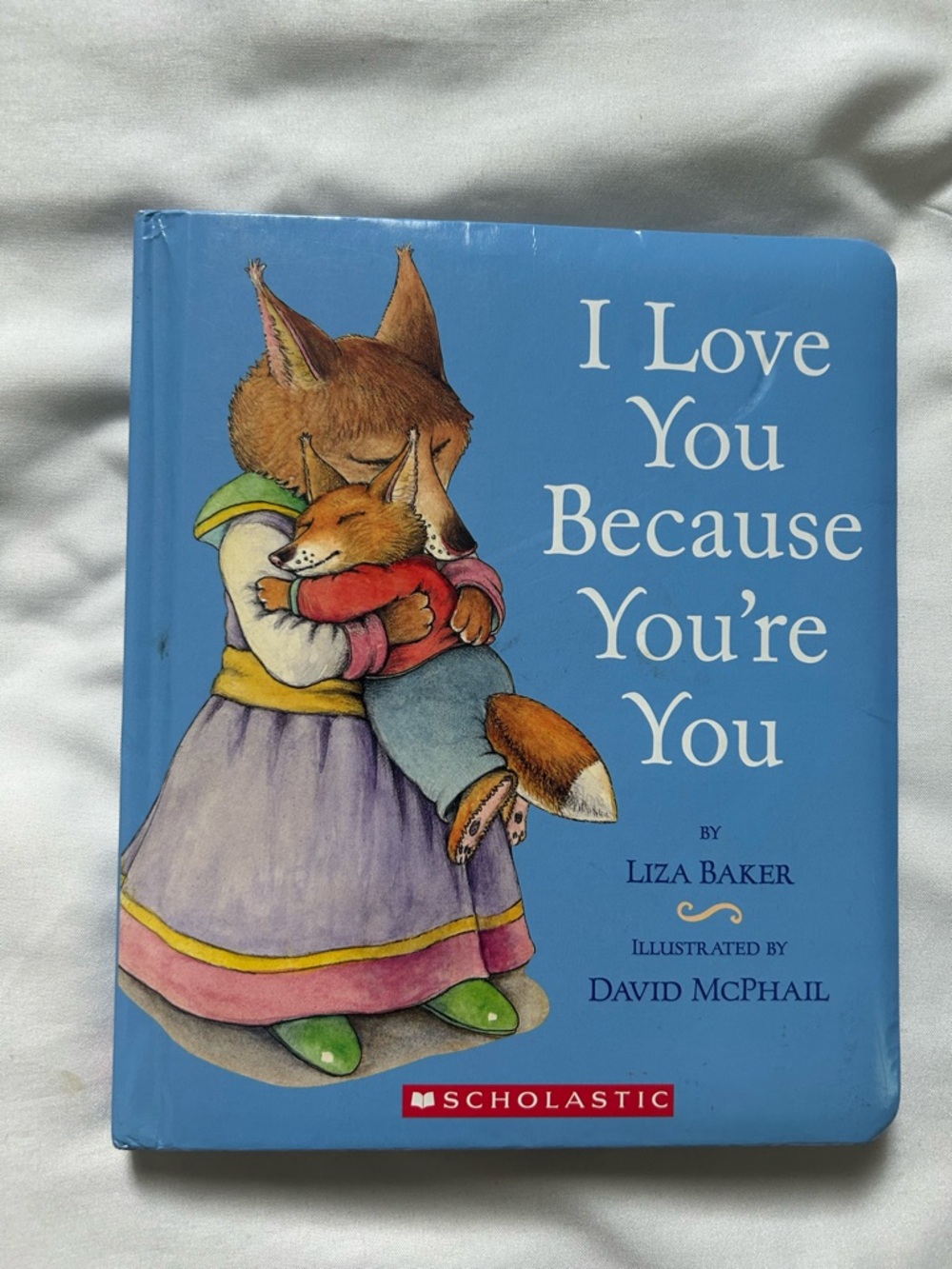 I love you because you’re you board book By Liza Baker